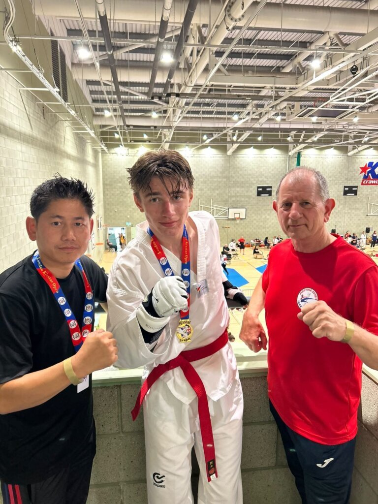 Ben with gold medal at Kixstar Open Kyorugi Championships