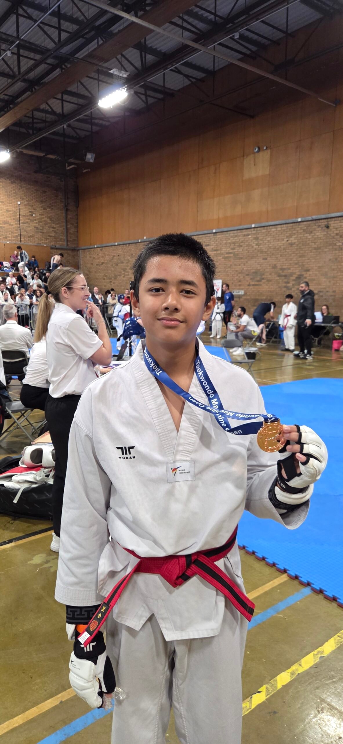 Crimson Khatiwada with bronze medal at Taekwondo Machine Open 2026