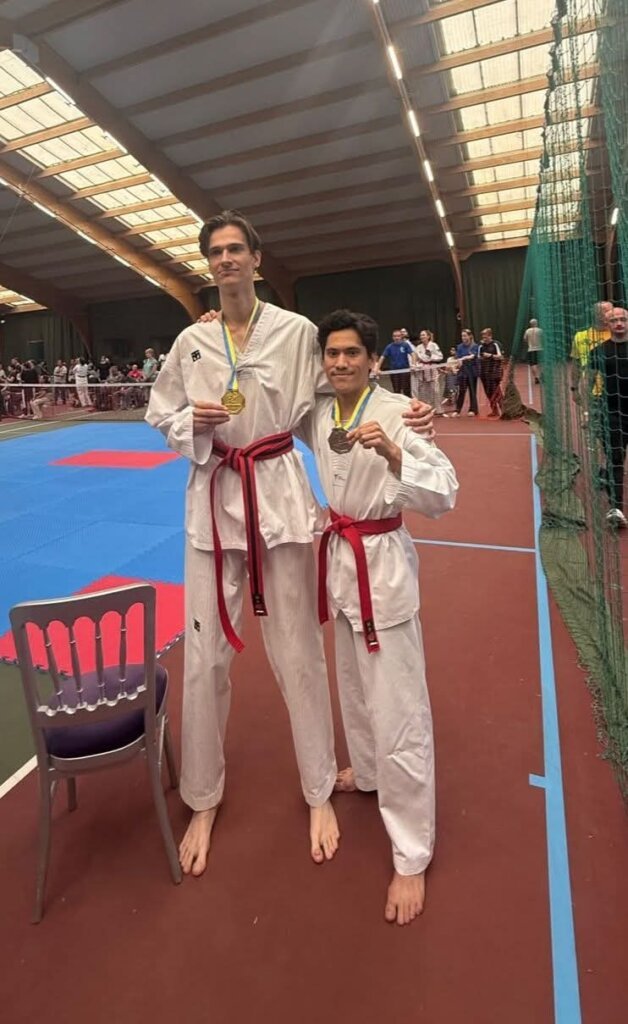 Thomas Reed with gold medal at Blue Wave Poomsae
